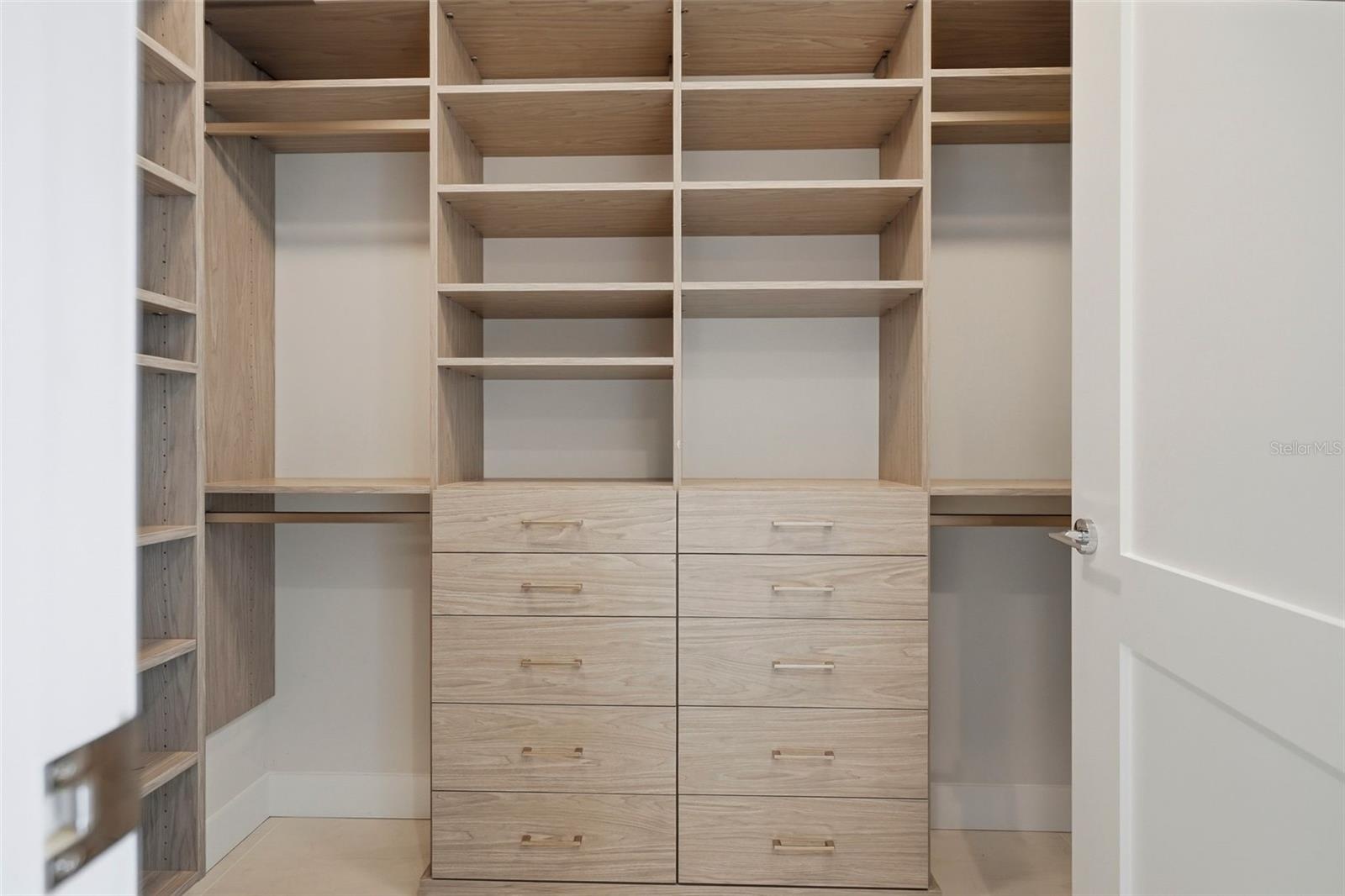 Dual Primary Closets with California Closets systems