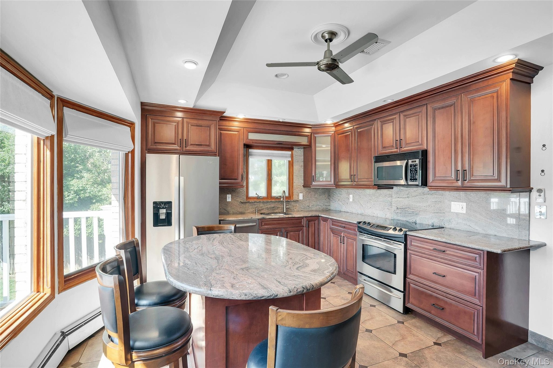 Updated kitchen with wood cabinets.