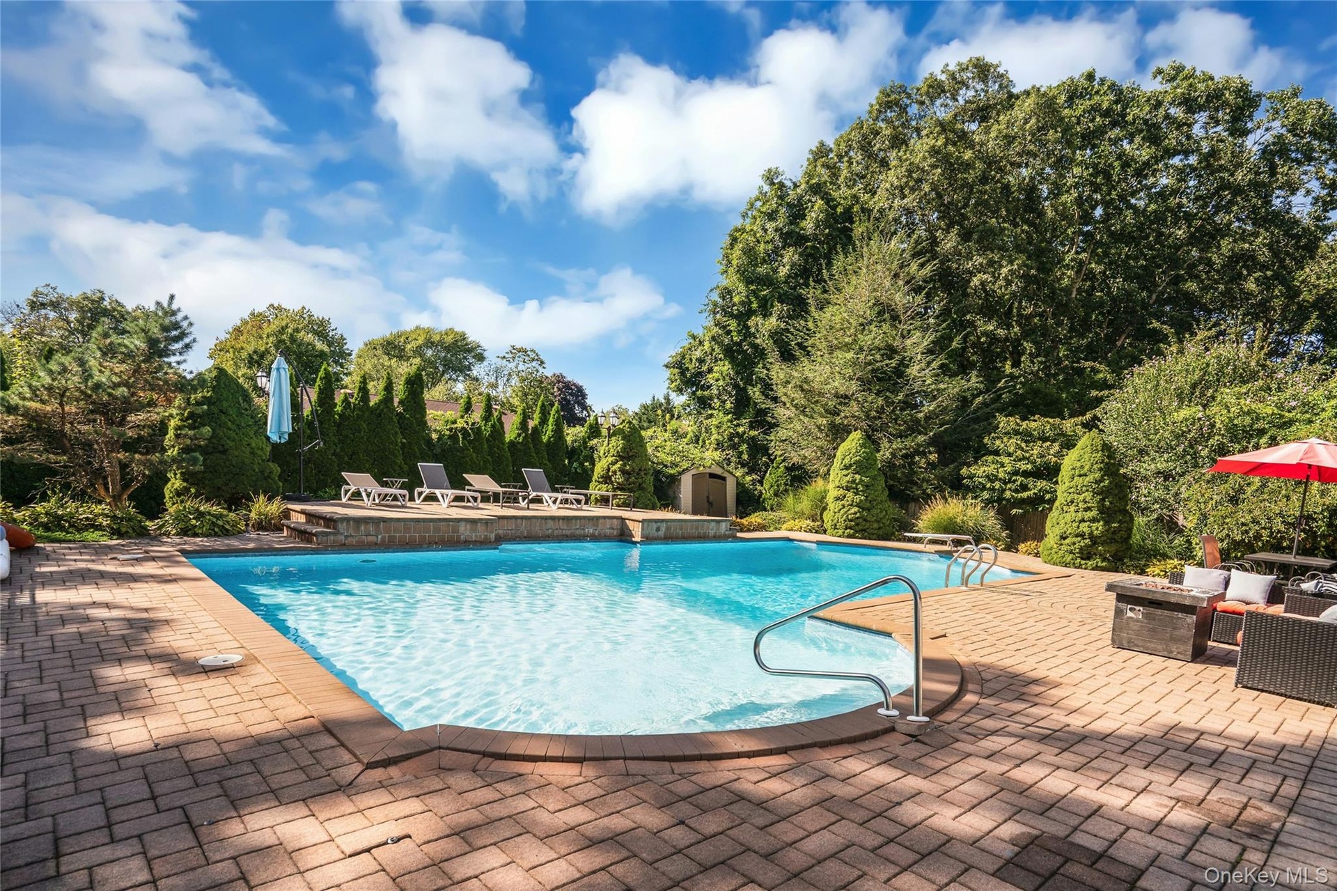 Heated pool with diving board.