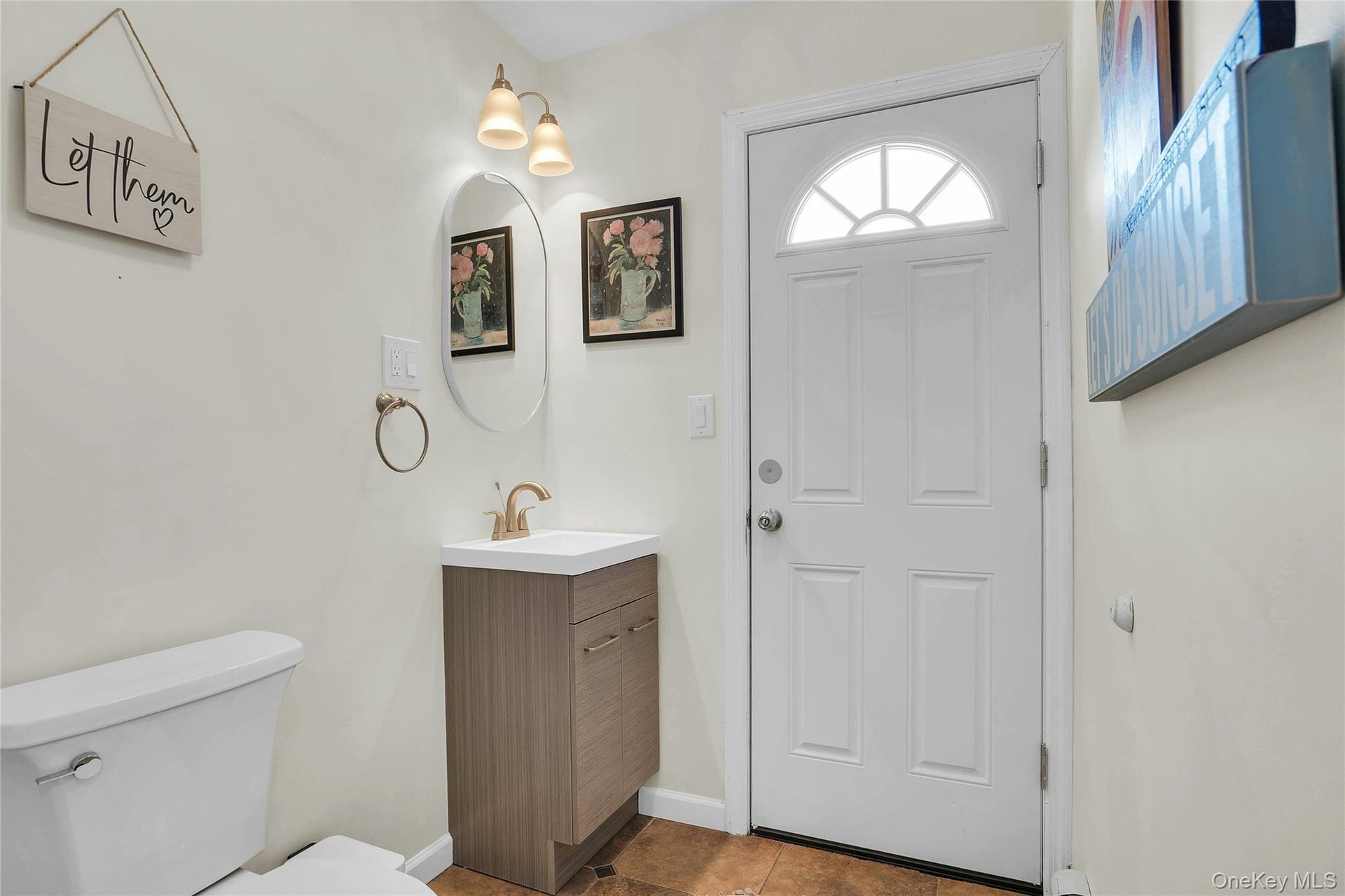 Half bath with outside entrance from the yard.