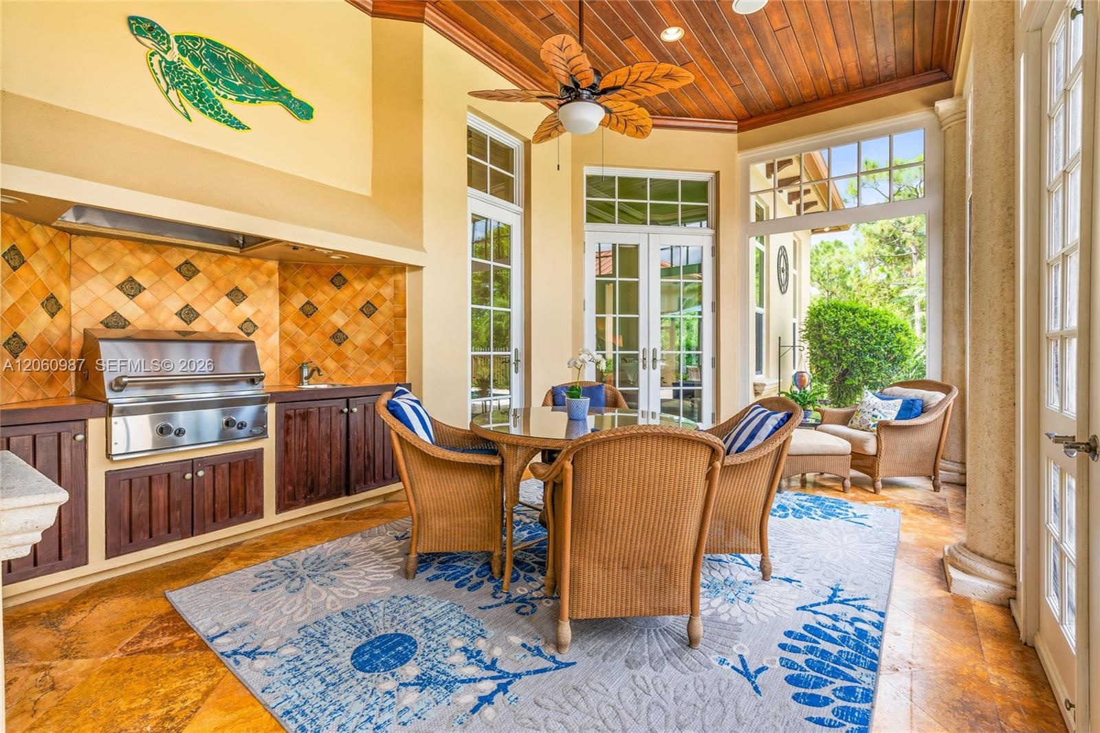Summer kitchen, screened patio & entry to casita