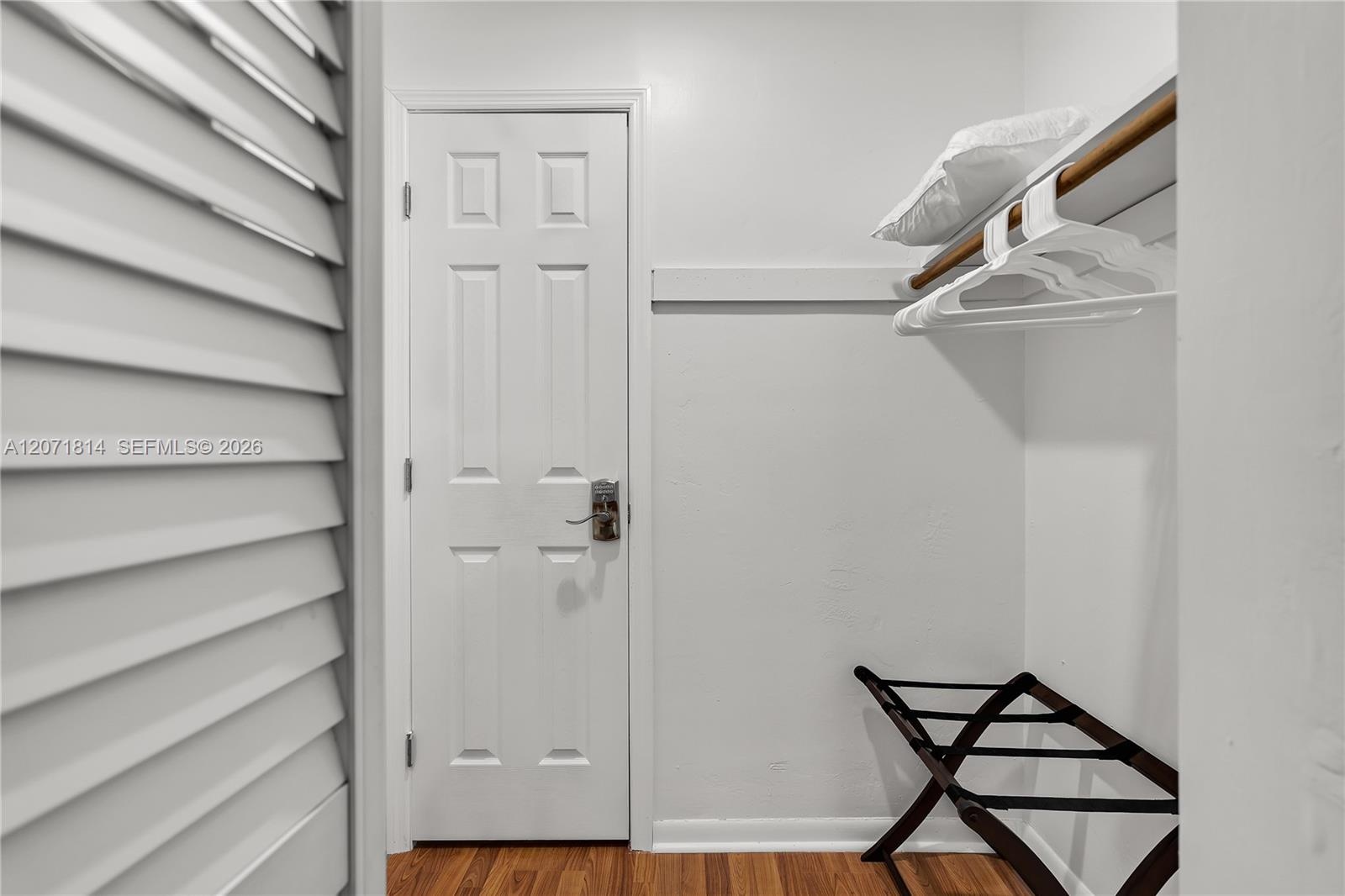 Custom-built walk-in closet with ample shelving and organization