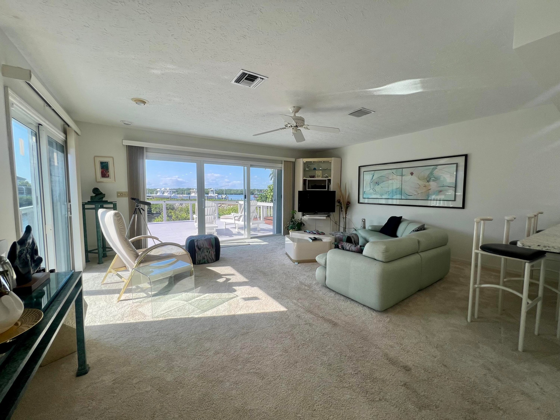 Wall-to-wall carpeting and neutral wall tones