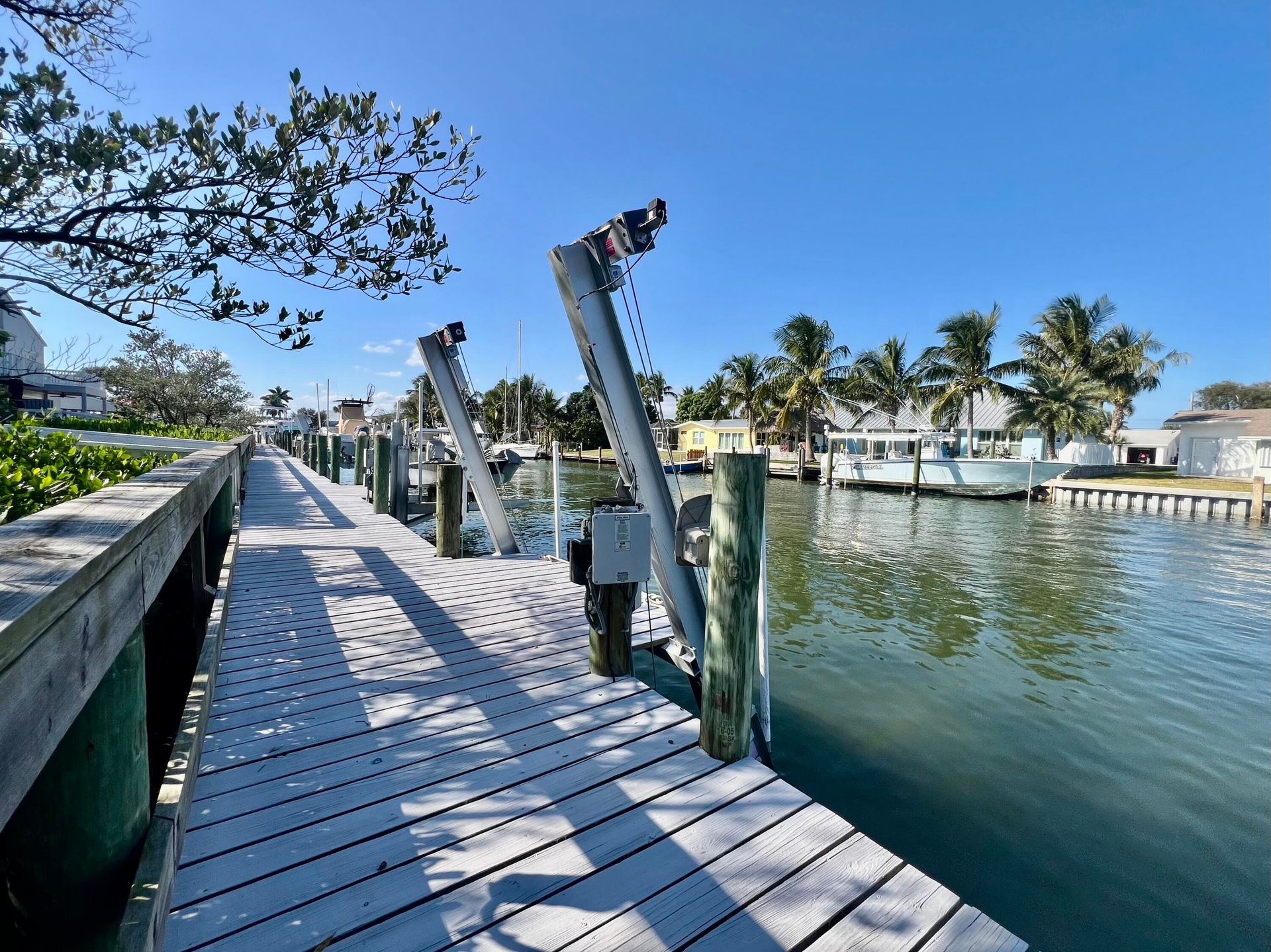 Wood dock with boat lifts