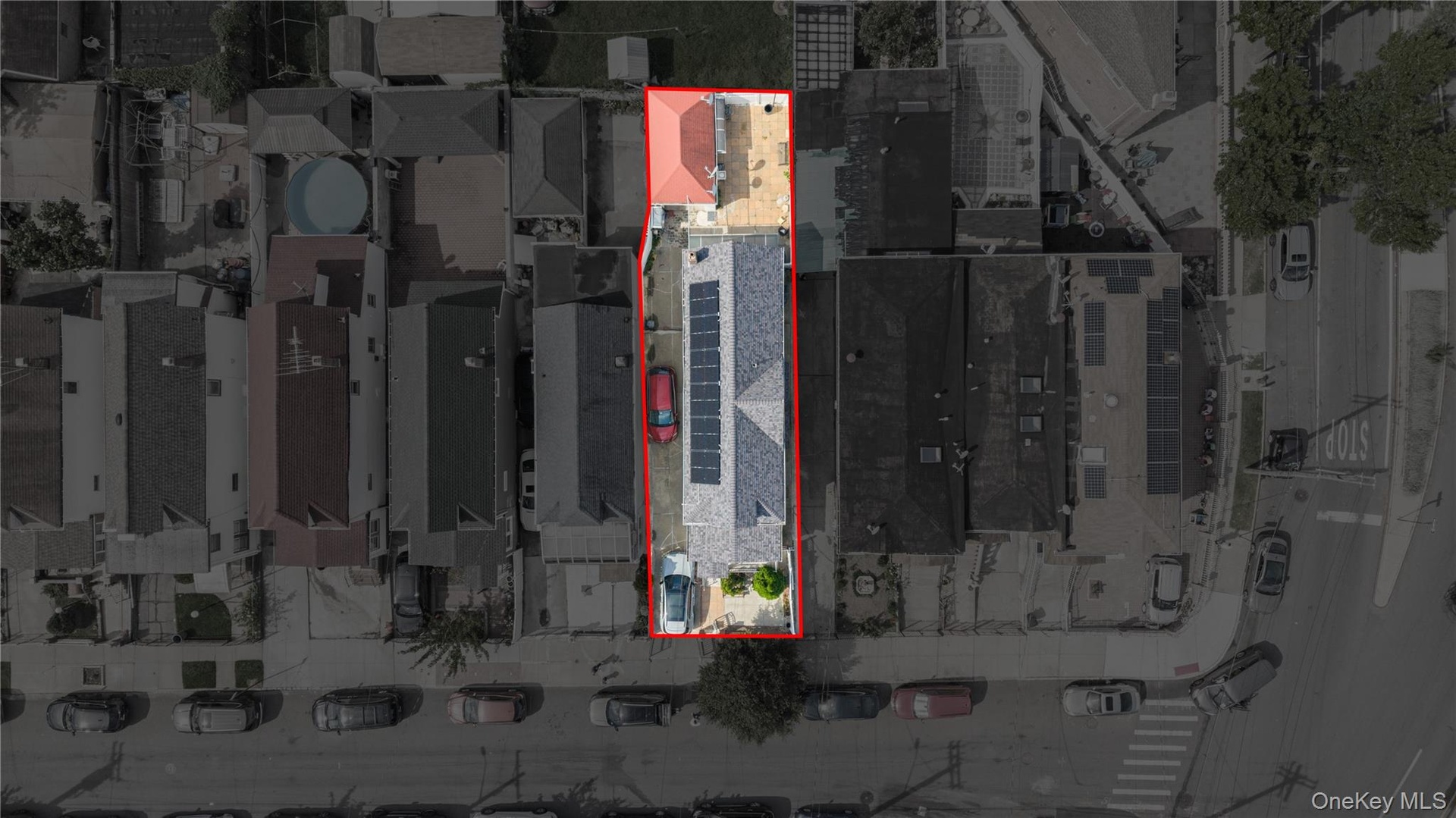 Property perimeter highlighted in red, featuring a rectangular lot