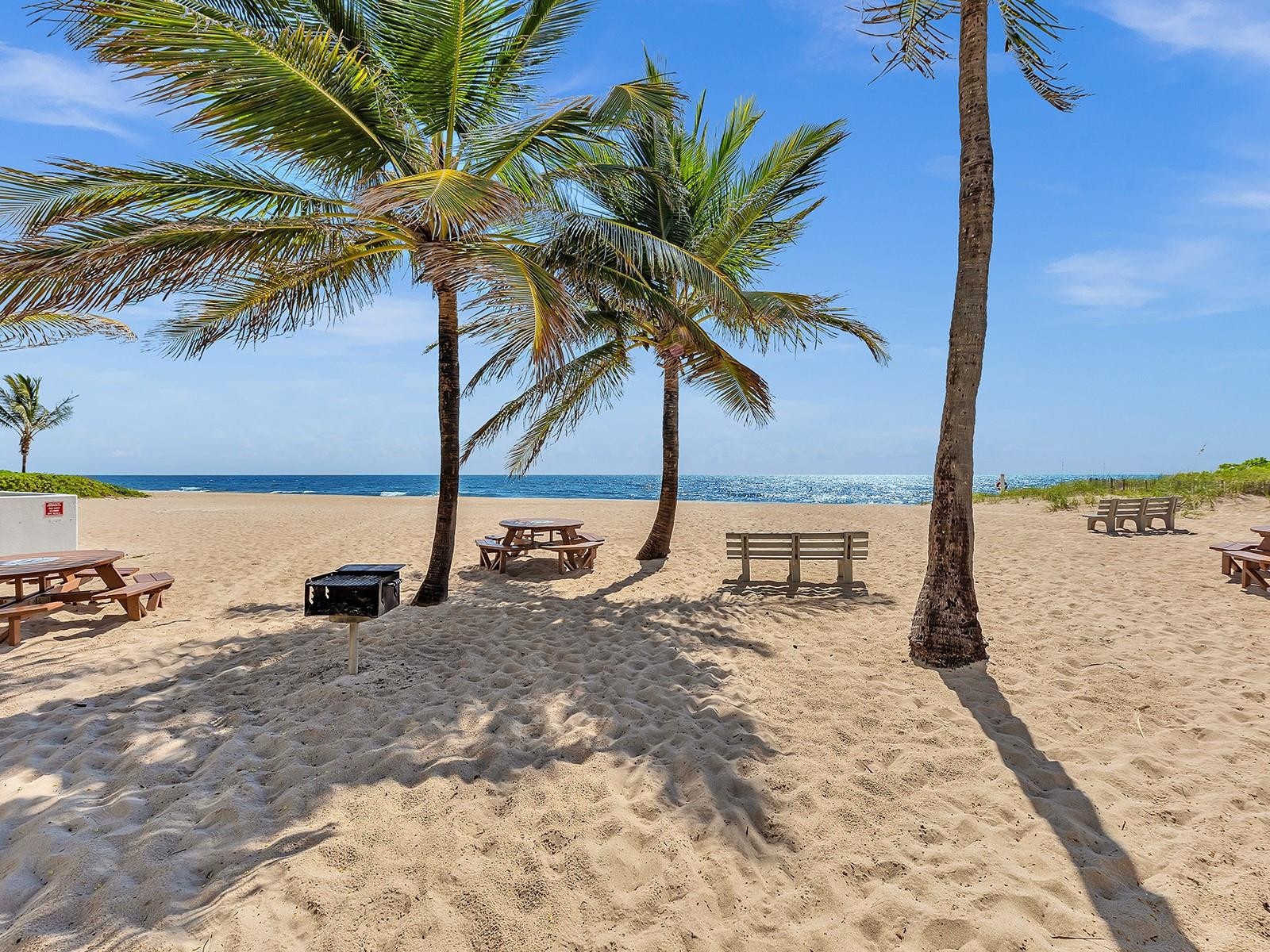 There are 3 charcoal grills at the private beach, with multiple picnic tables and showers.