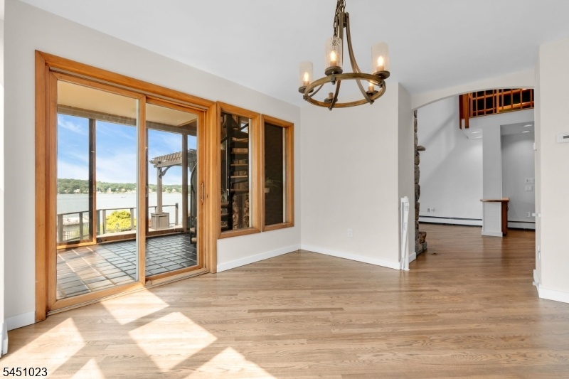 Dining open to sun room