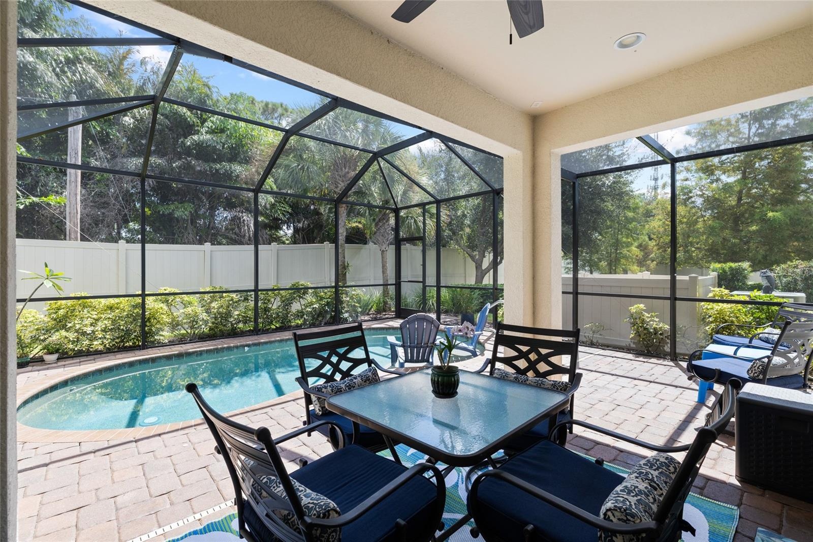 Covered porch area over looking salt water pool. Fully enclosed screen.