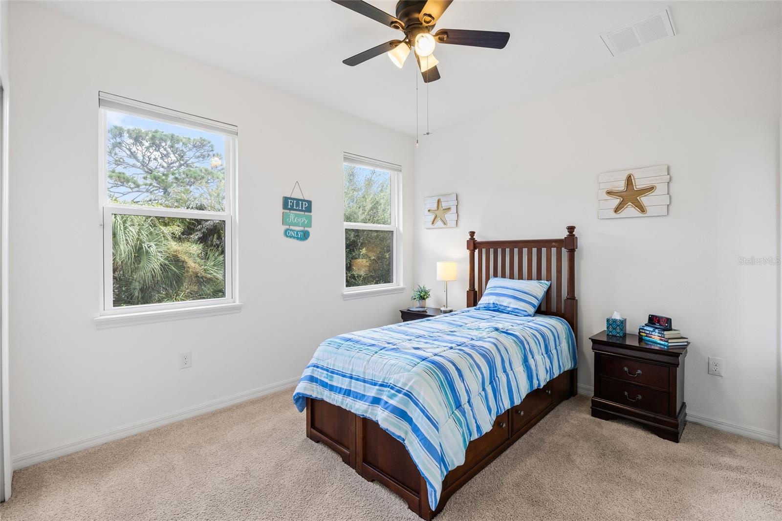 Bedroom 2 with private ensuite bath.