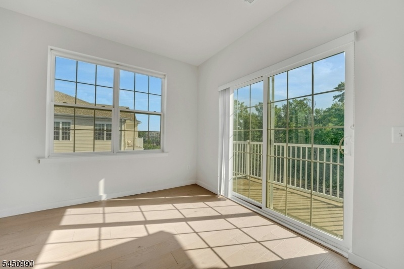 Living Room w/ Balcony access