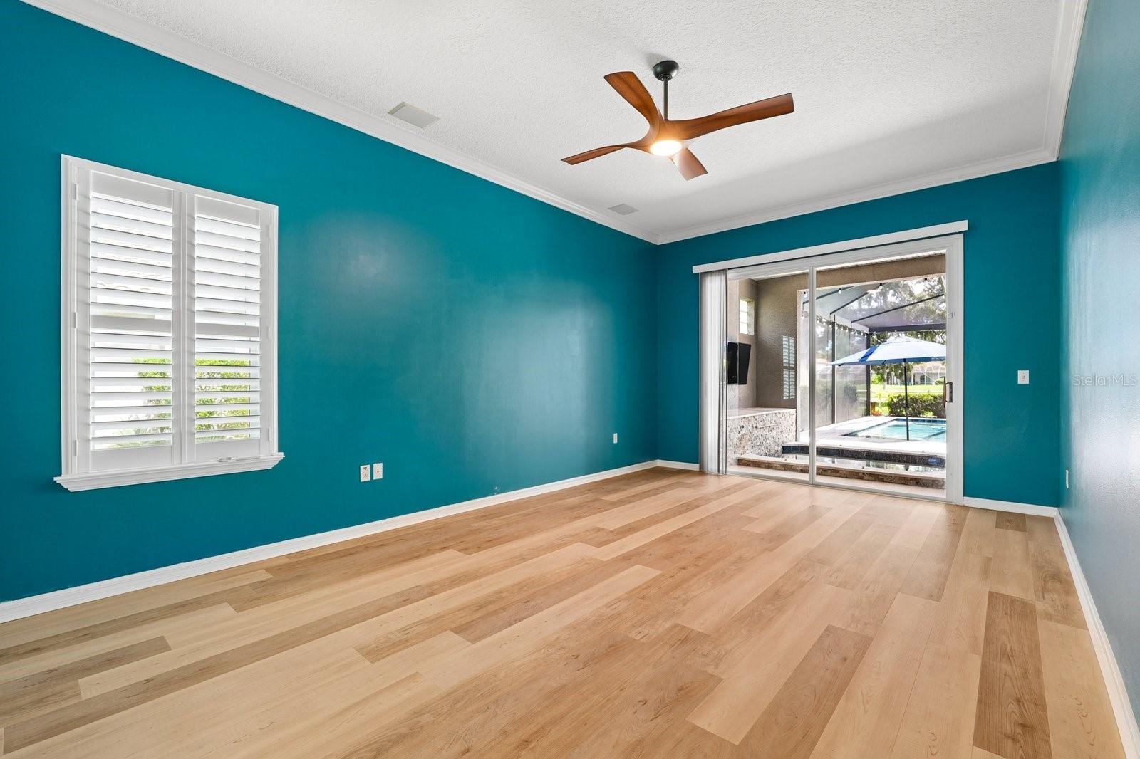 Primary Bedroom with Sliders to Pool