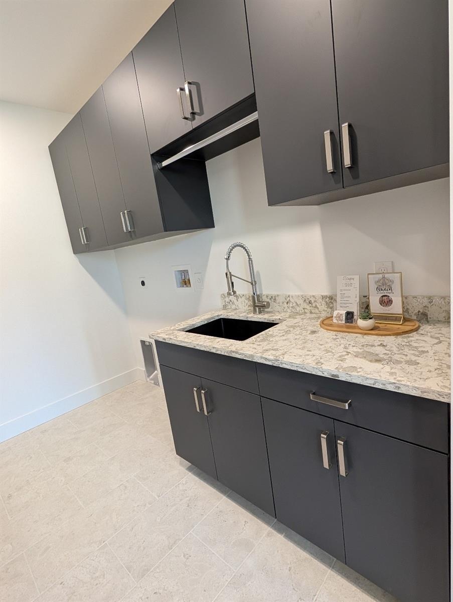Custom cabinetry in main floor laundry