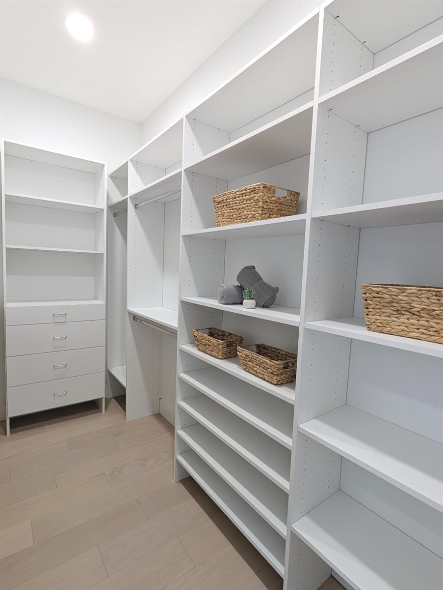 Two custom walk in closets
