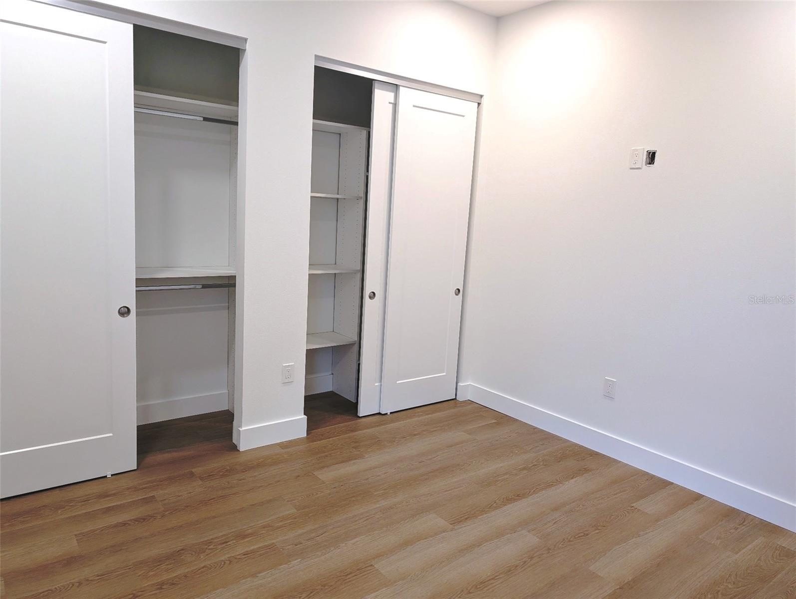 Guest Suite Bedroom; custom closets