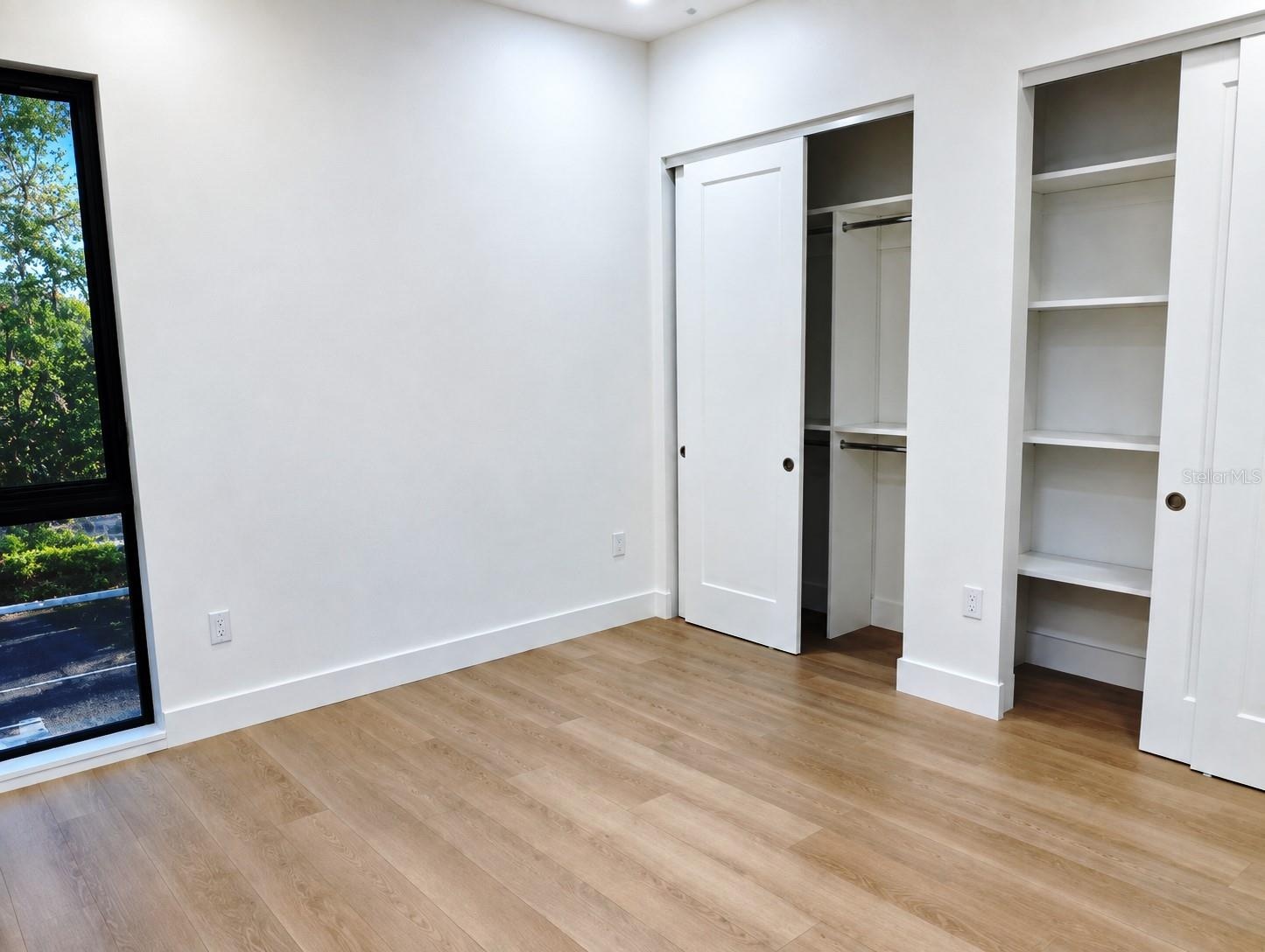 Guest Suite Bedroom; custom closets