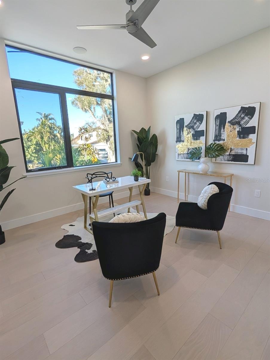 Main floor office or bedroom with full bath and spacious closet