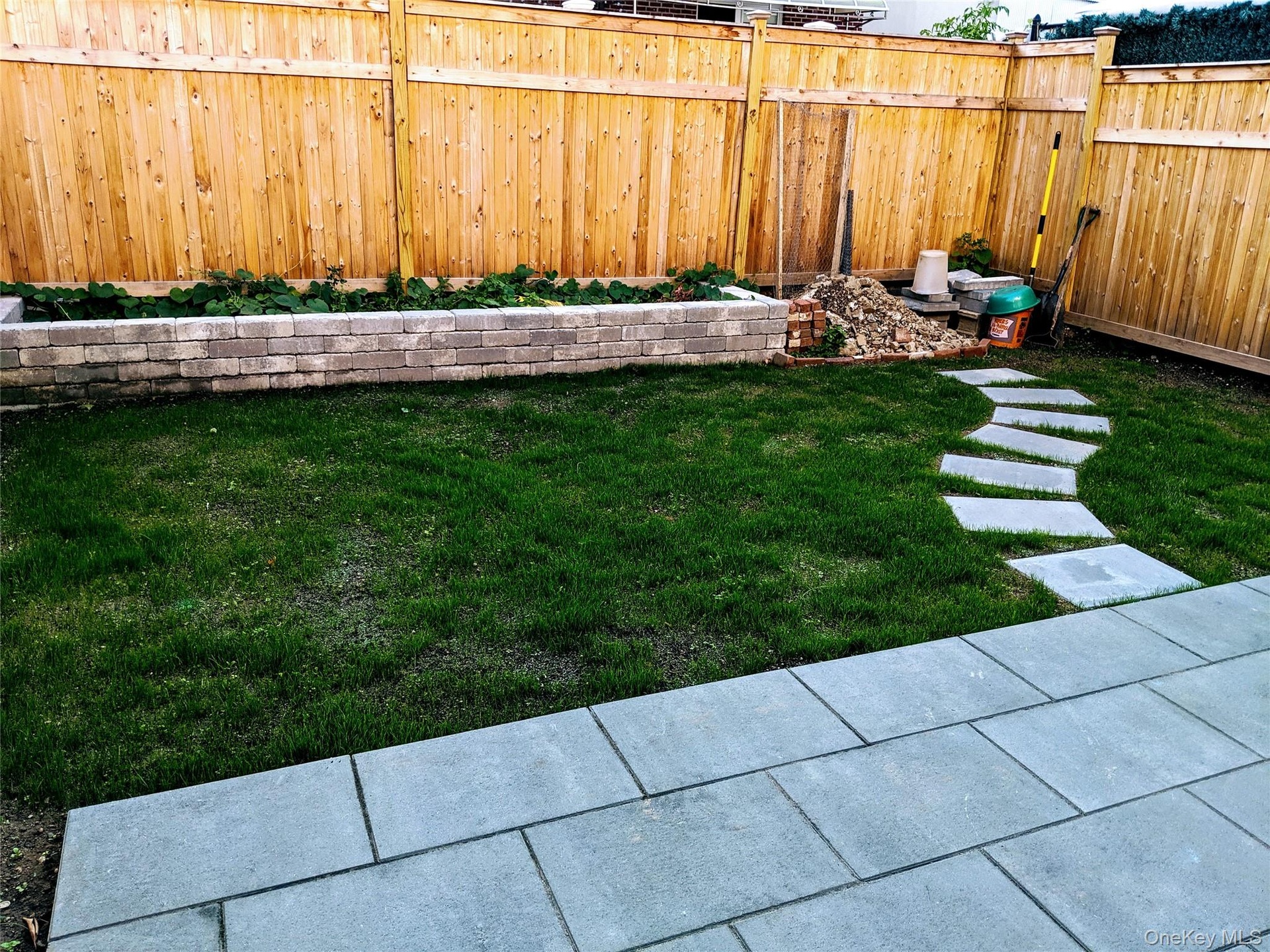Backyard area with planter bed