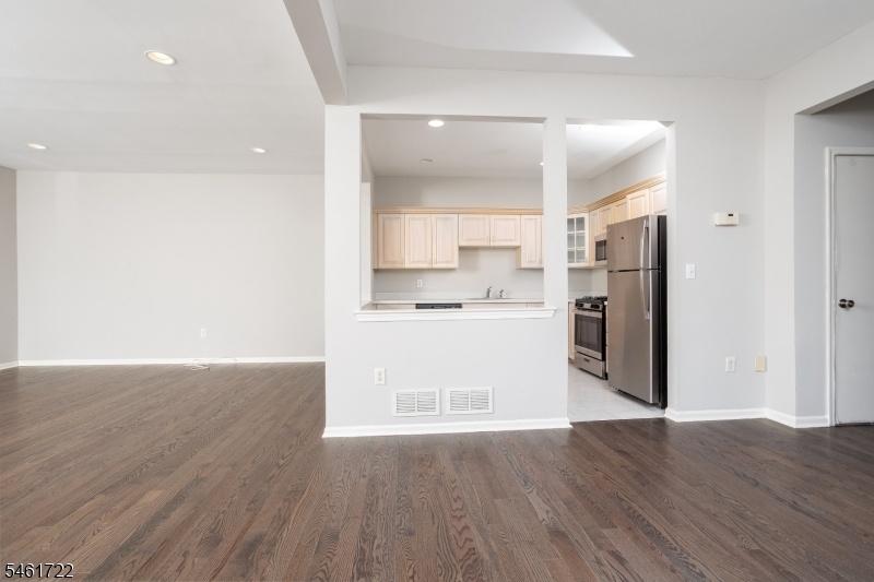 VIEW FROM DINING AREA TO KITCH