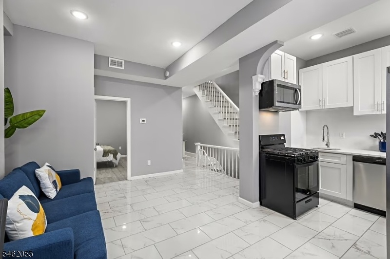Living Area/View of Stairs