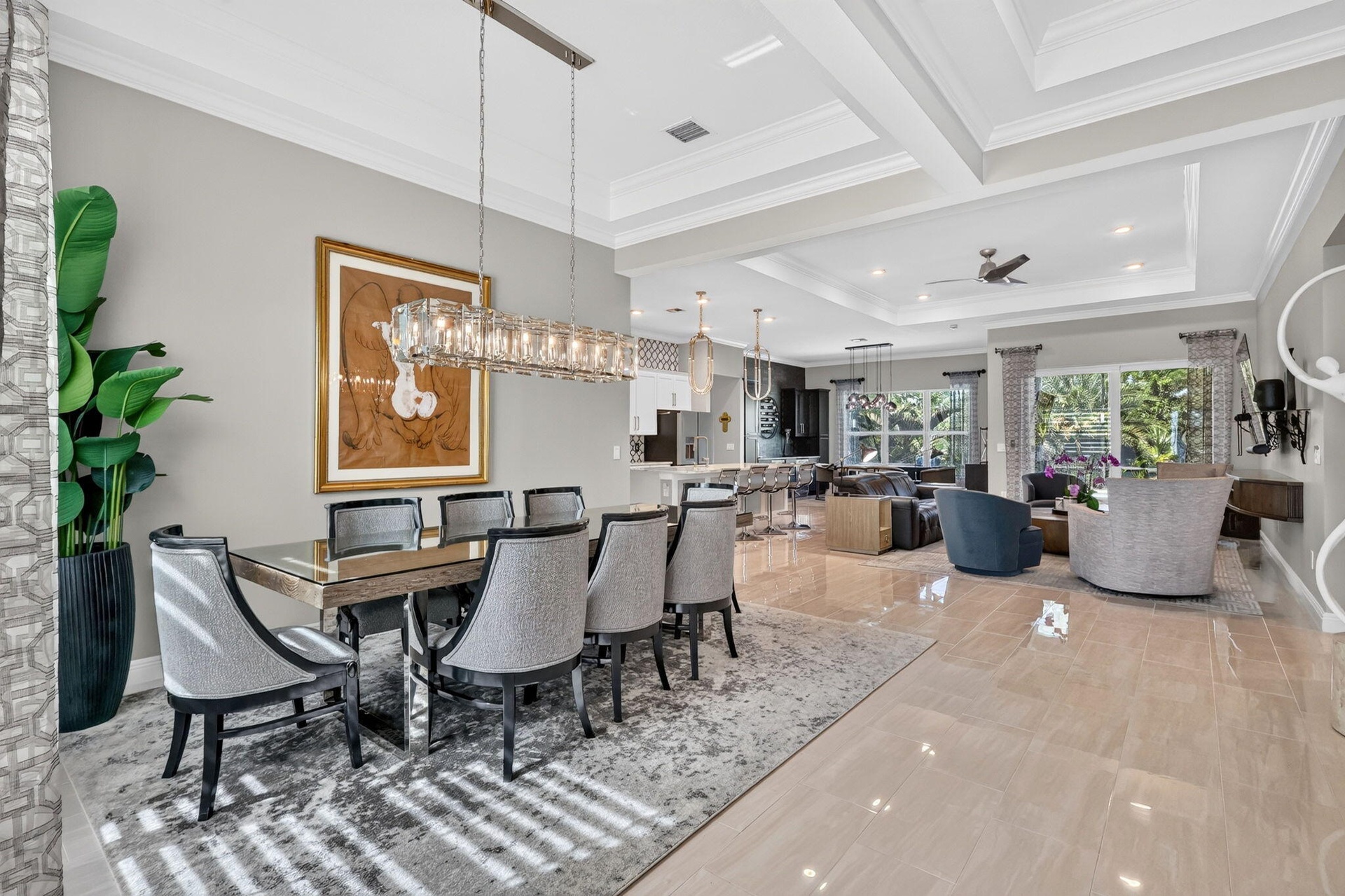 Dining Room with Polished Porcelain tile and custom lighting
