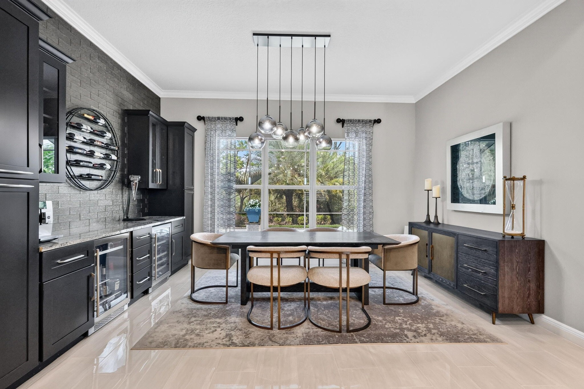 Custom Bar with large pull out pantries each side and custom wine/beverage cooler and additional dining area for entertaining.