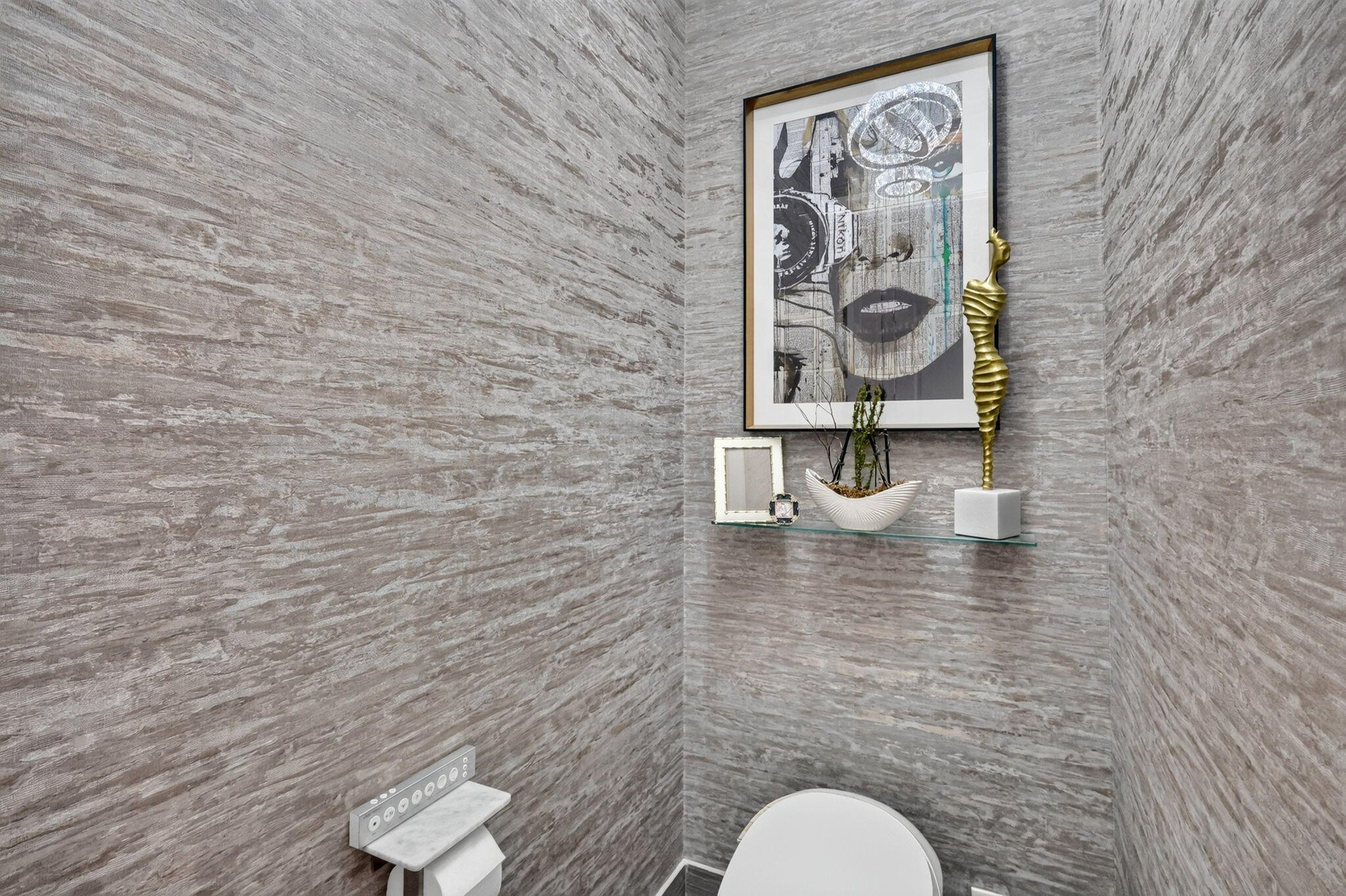 Lovely primary water closet with bidet toilet and custom Italian wallpaper and chandelier