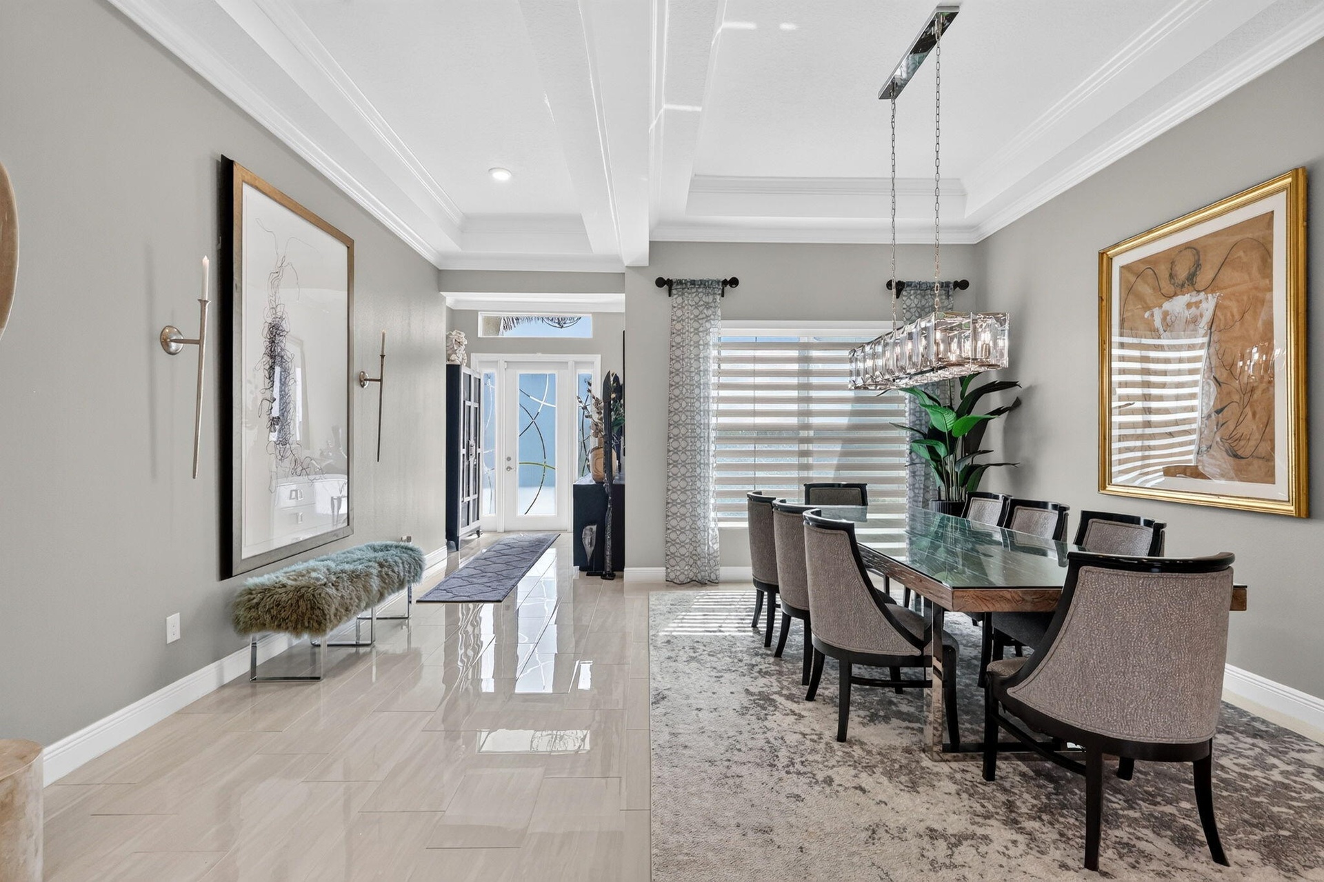 Open Concept Entry/Dining/Living Area with Beautiful view to Pool and outdoor oasis