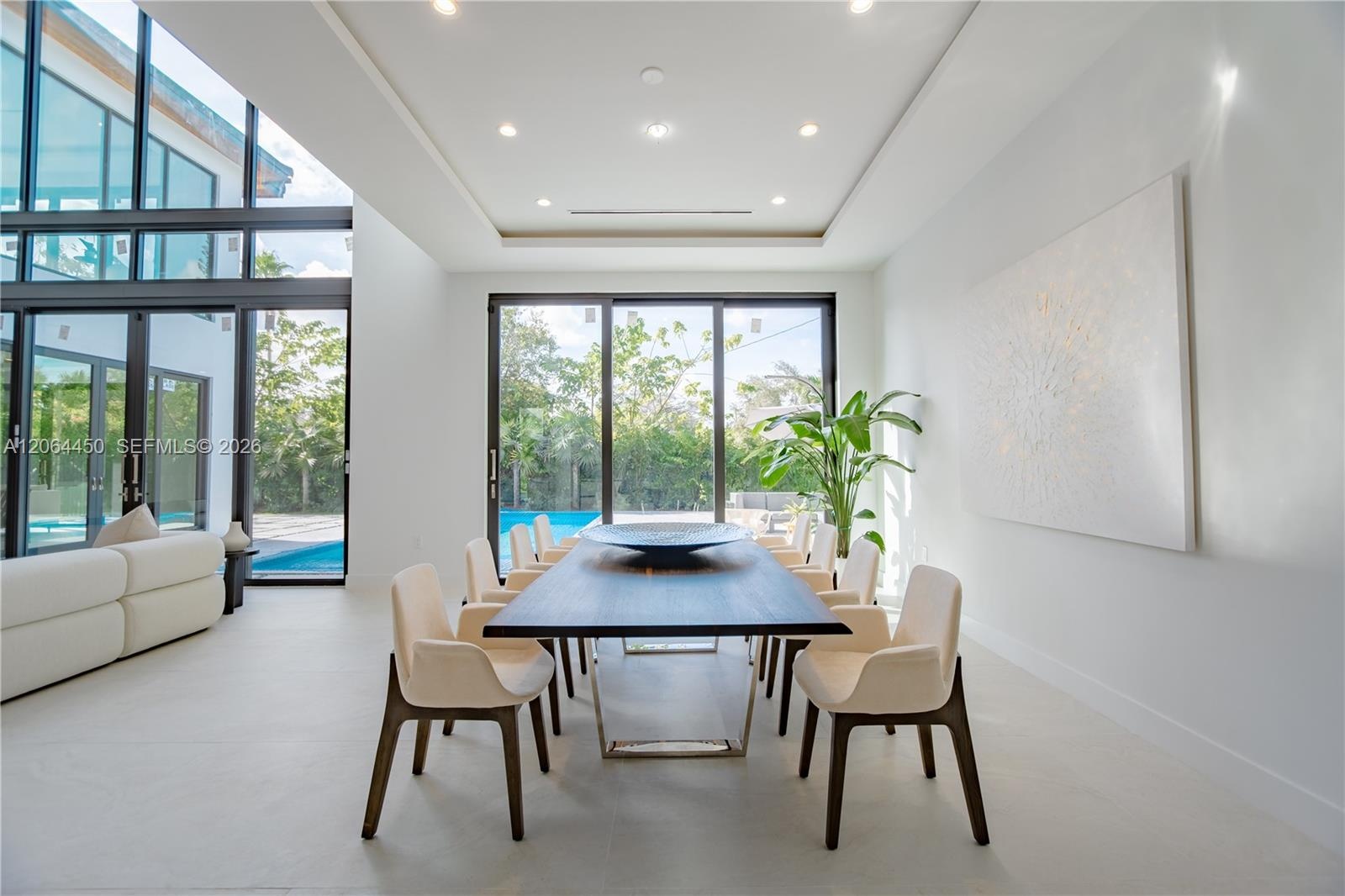 Open concept living and kitchen with contemporary finishes throughout