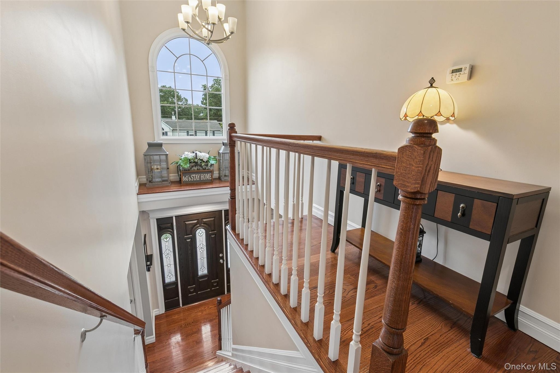 2 Story Foyer with Landing, Accented with Paladium Window