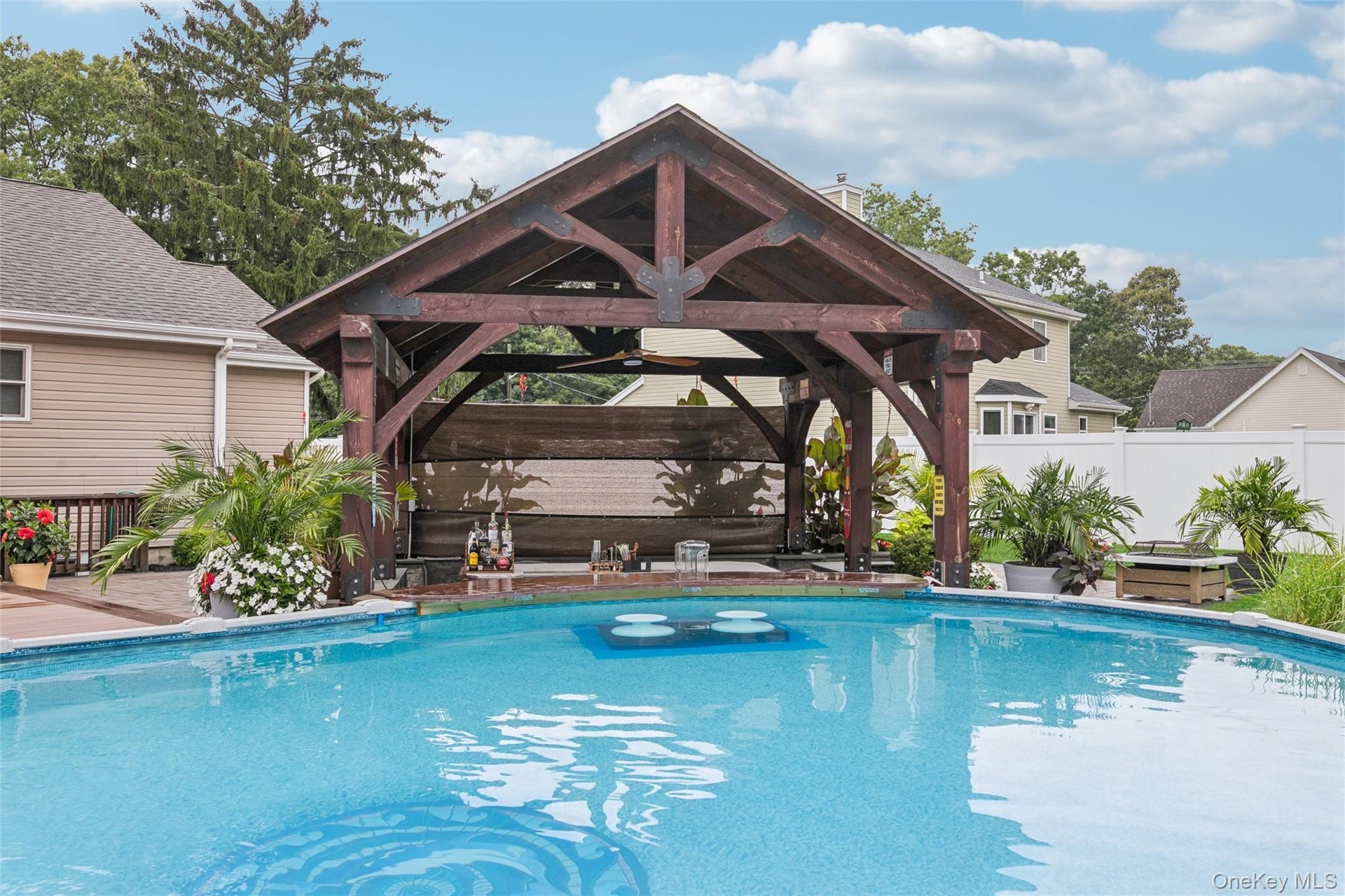 Custom Outdoor 14 x 14 Pavillion Offers a Swim-up Bar