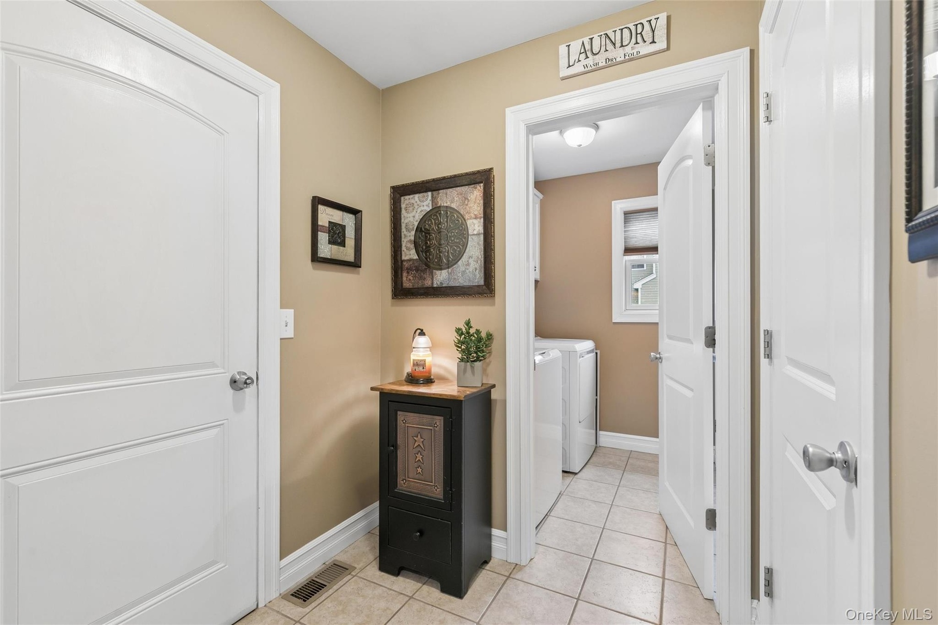 Access From Kitchen to Garage, 1/2 Bath, Laundry and Large Step-in Pantry