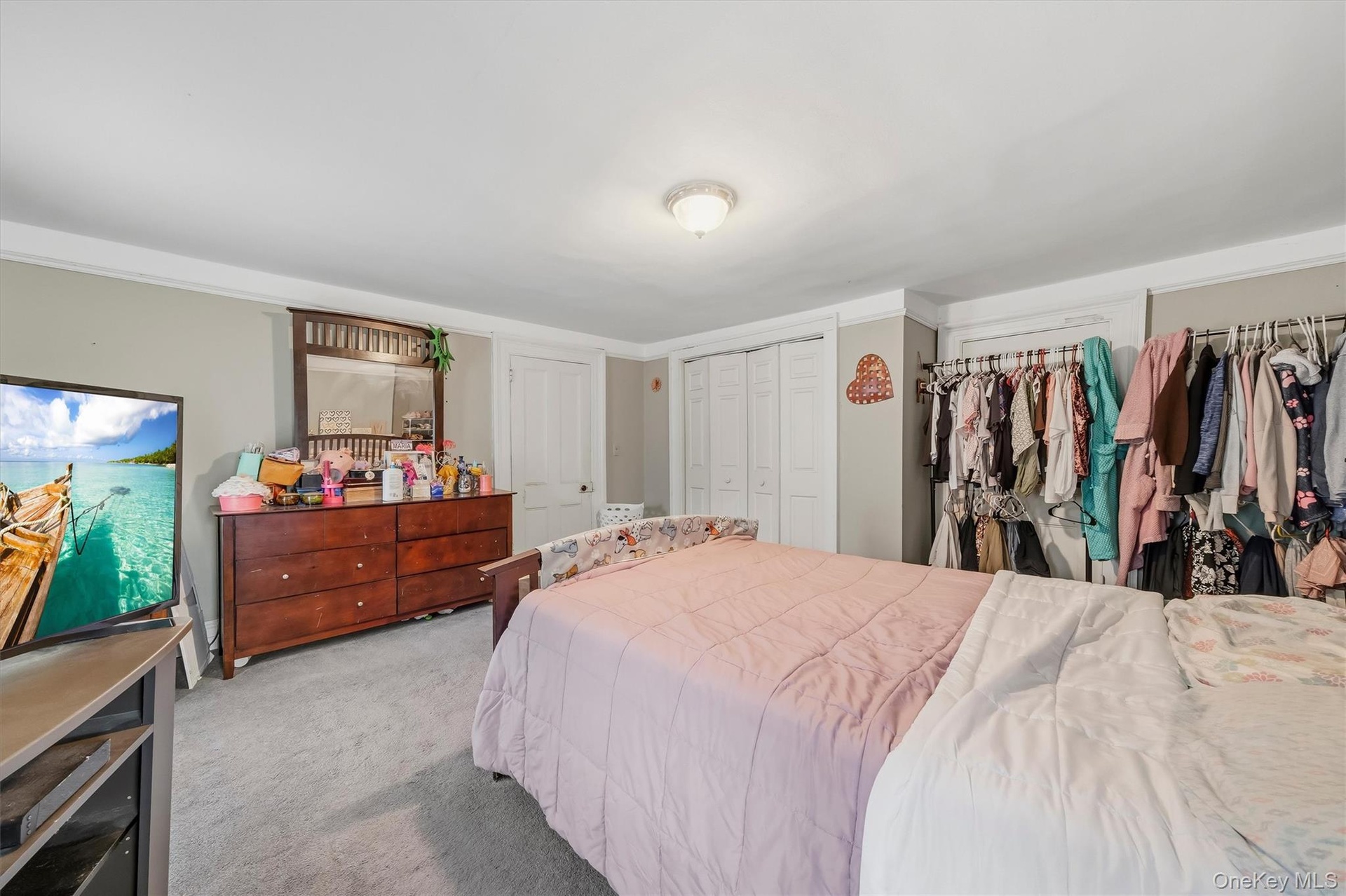 MAIN HOUSE - Another angle of the large primary bedroom.