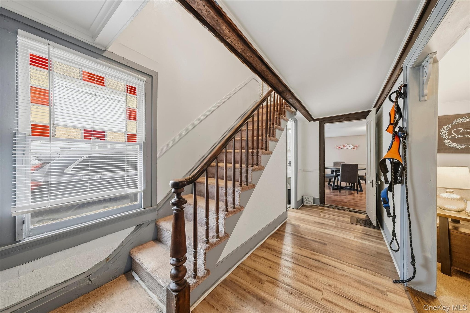 MAIN HOUSE - Another view of the entrance hall, showing the staircase and access to the adjoining rooms.