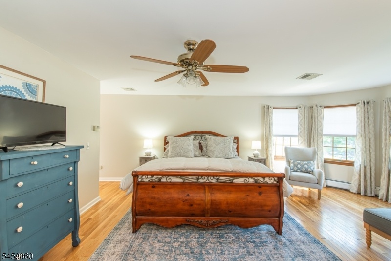 Primary Bedroom w/ hardwood