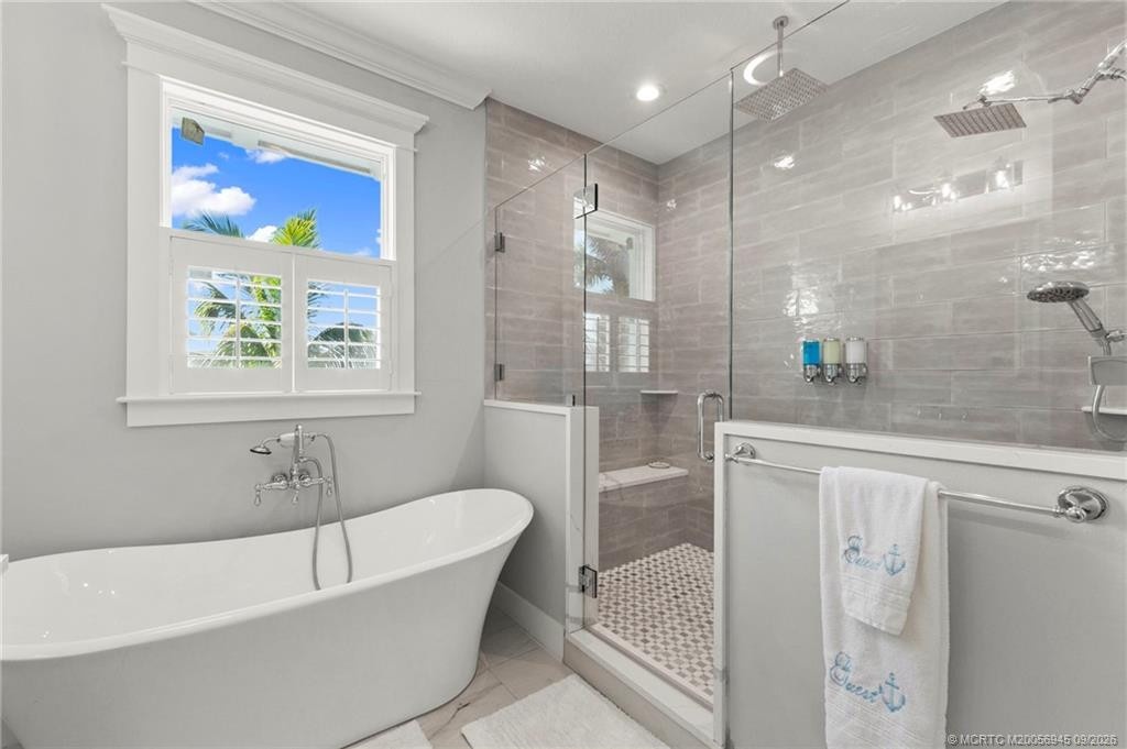 Dreamy Primary Bathroom with Soaking Tub and Large Walk in Shower