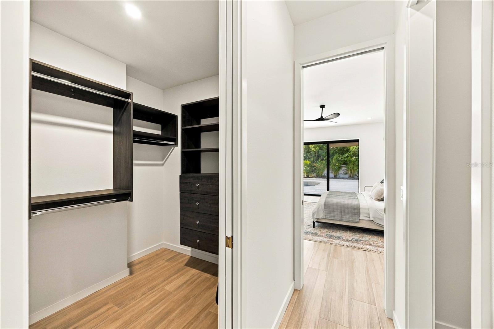 Primary Walk-In Closety with Built-ins
