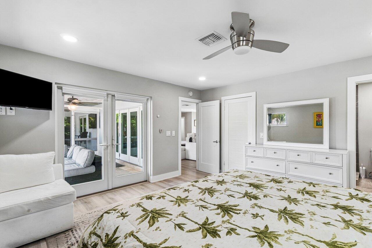 Master suite with French Doors leading to the pool patio