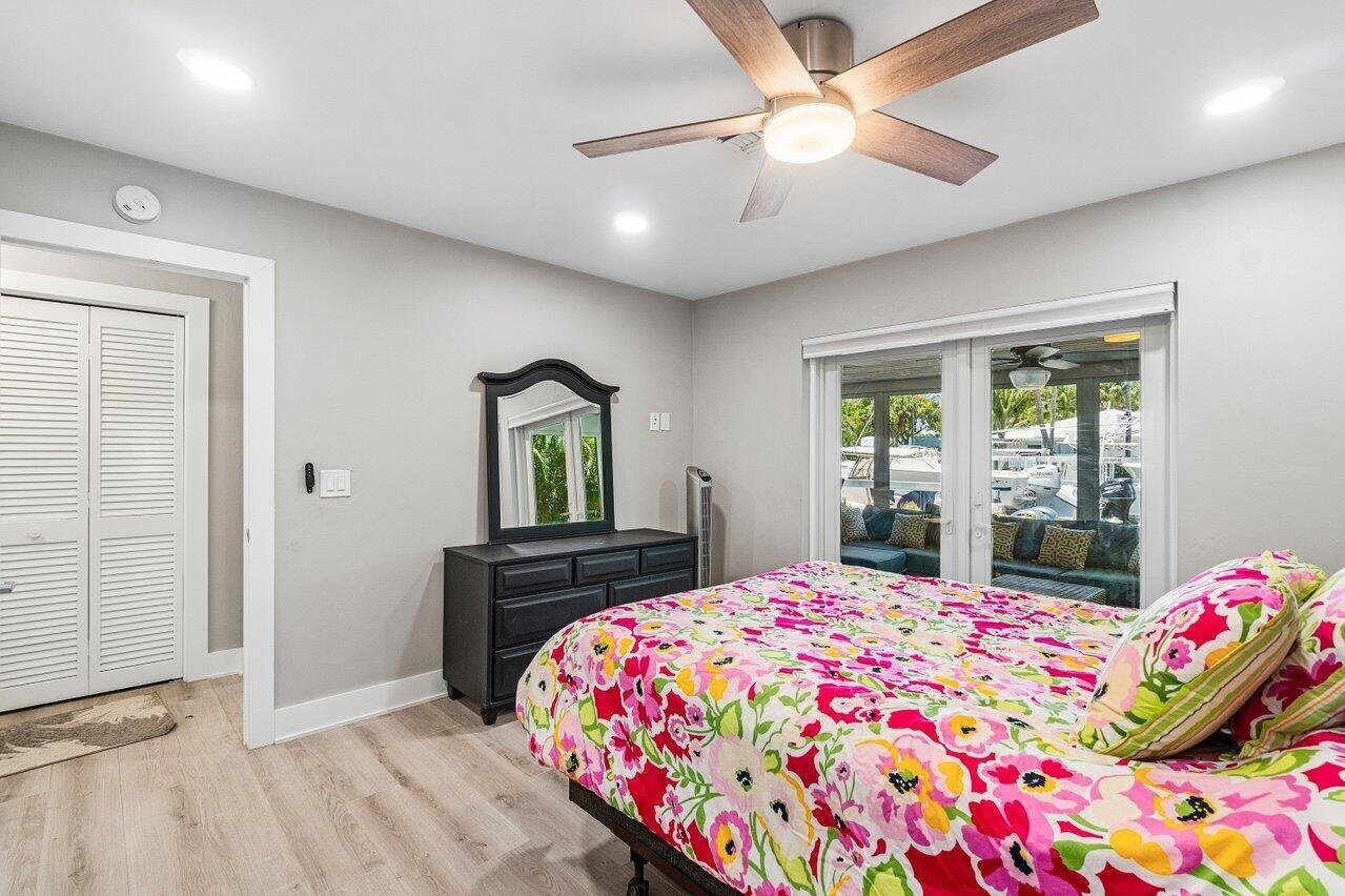 French door access to the enclosed porch and pool patio