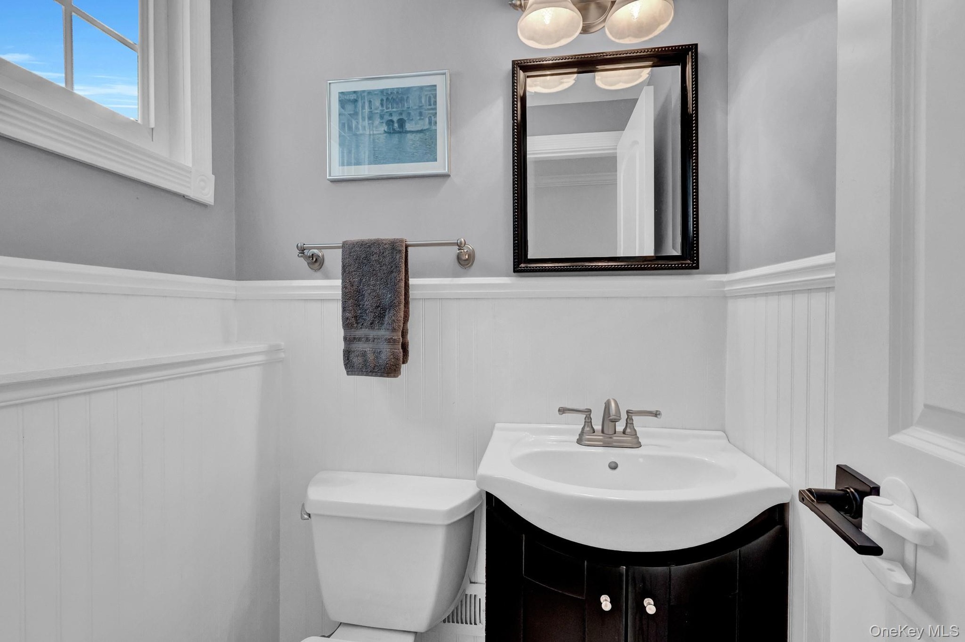 1/2 bathroom.Located on Den level.