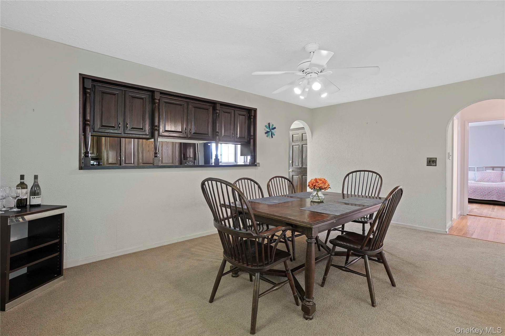 Dining Room is between the Kitchen and Living Room.
