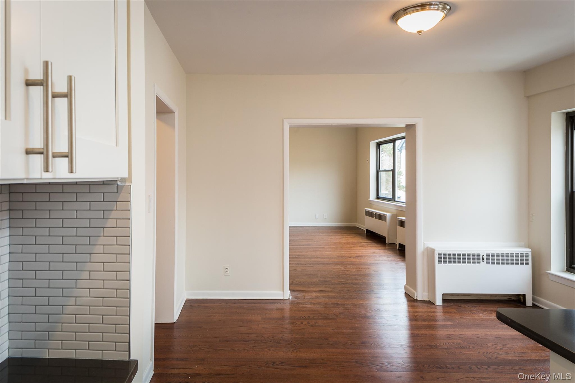 View from the Kitchen to the Dining Room into the Living Room