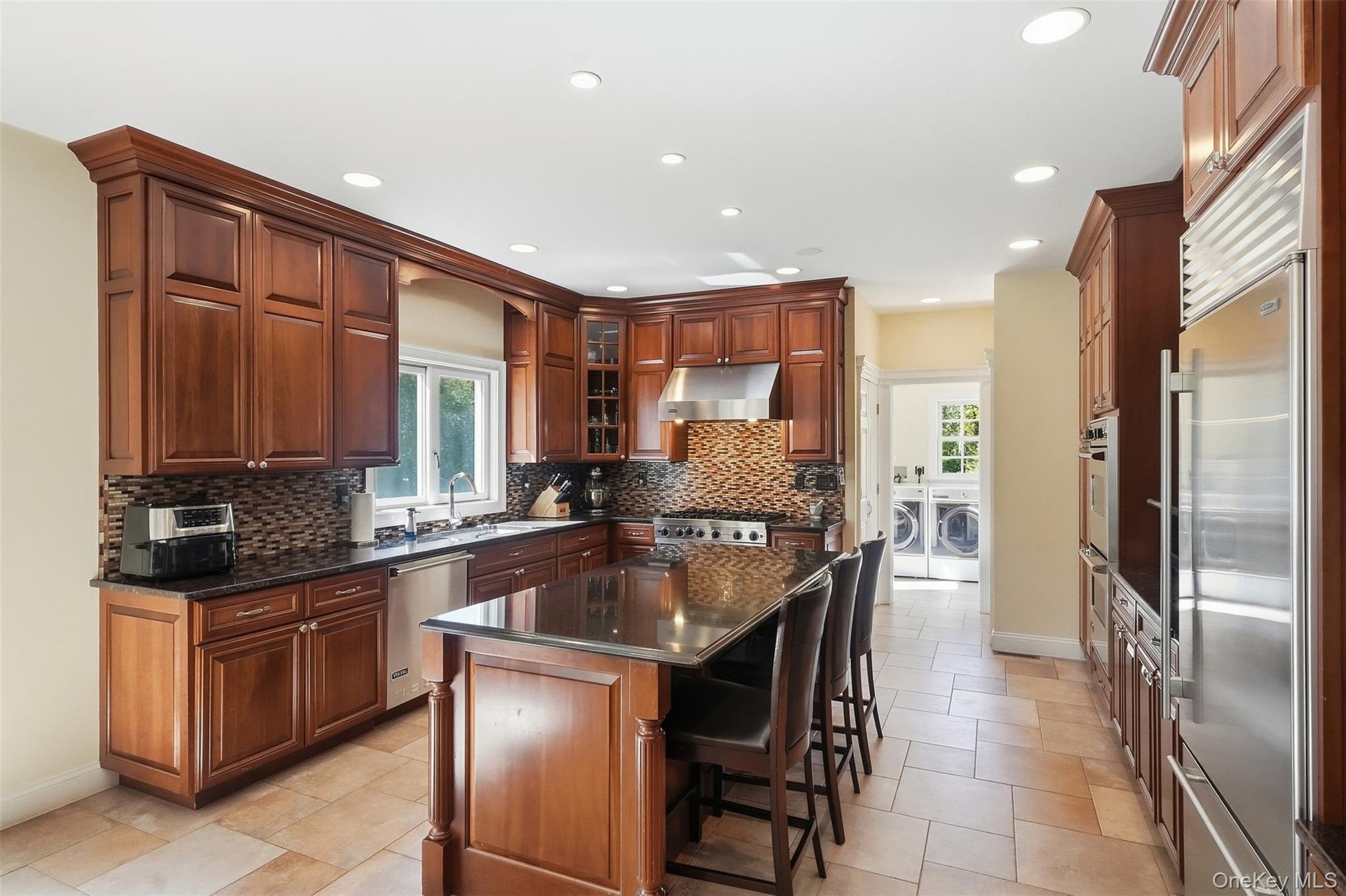 Kitchen leading to laundry room