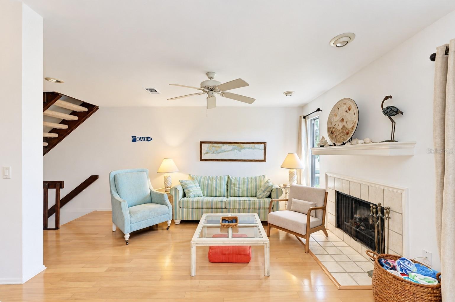 living room with wood burning fireplace