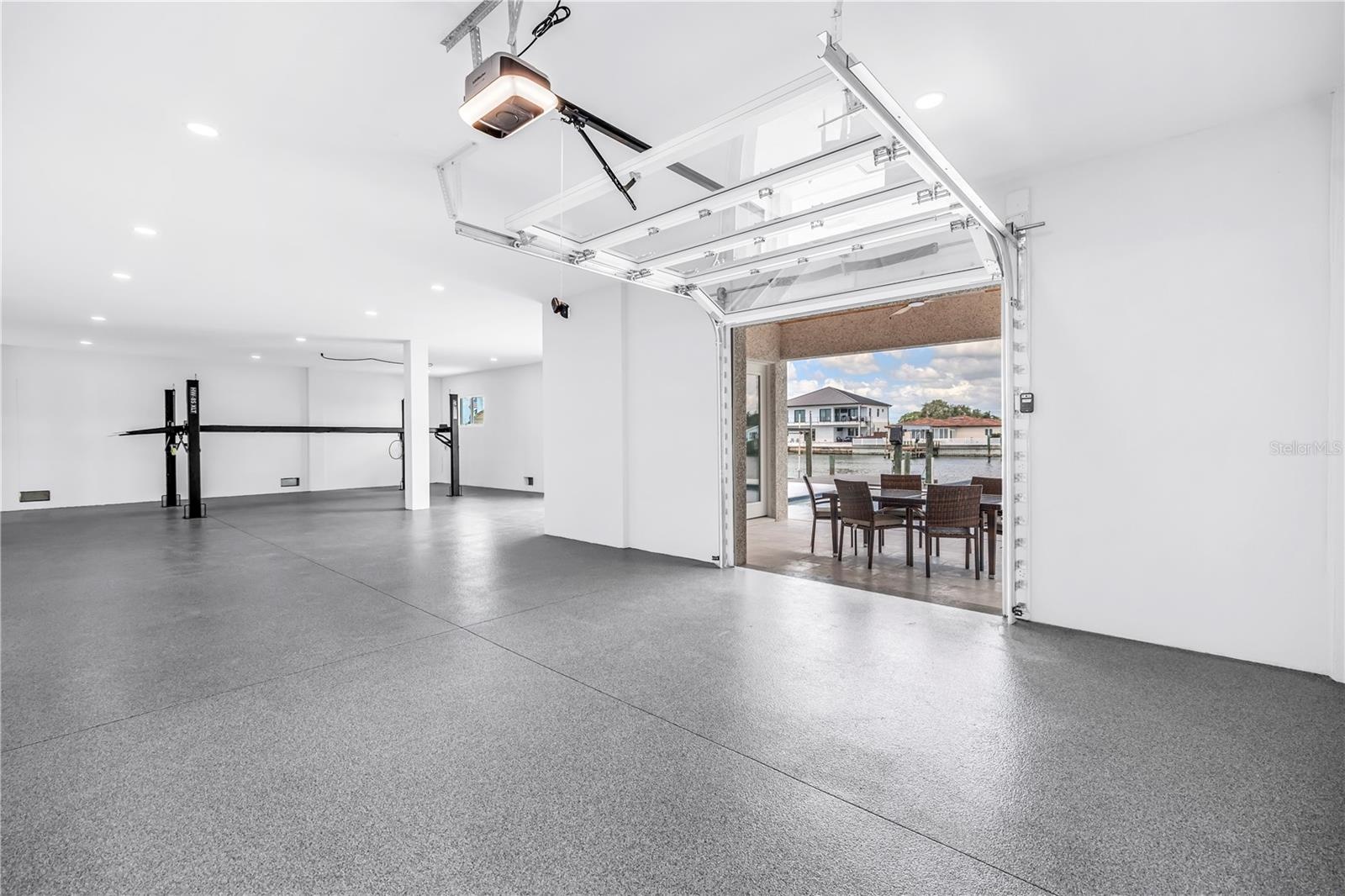 FULL GLASS GARAGE DOOR, EASY ACCESS TO DOCK