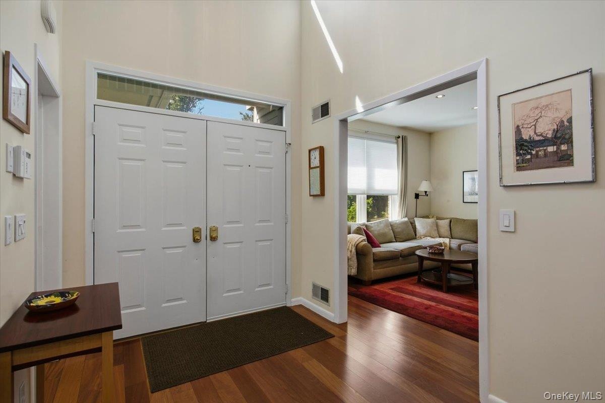 A dramatic two-story entrance foyer creates an impressive first impression.