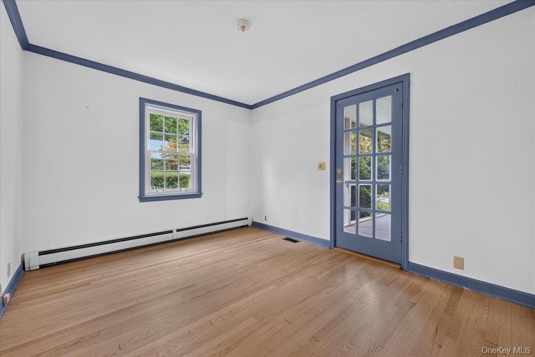 First floor bedroom with access to screened in porch