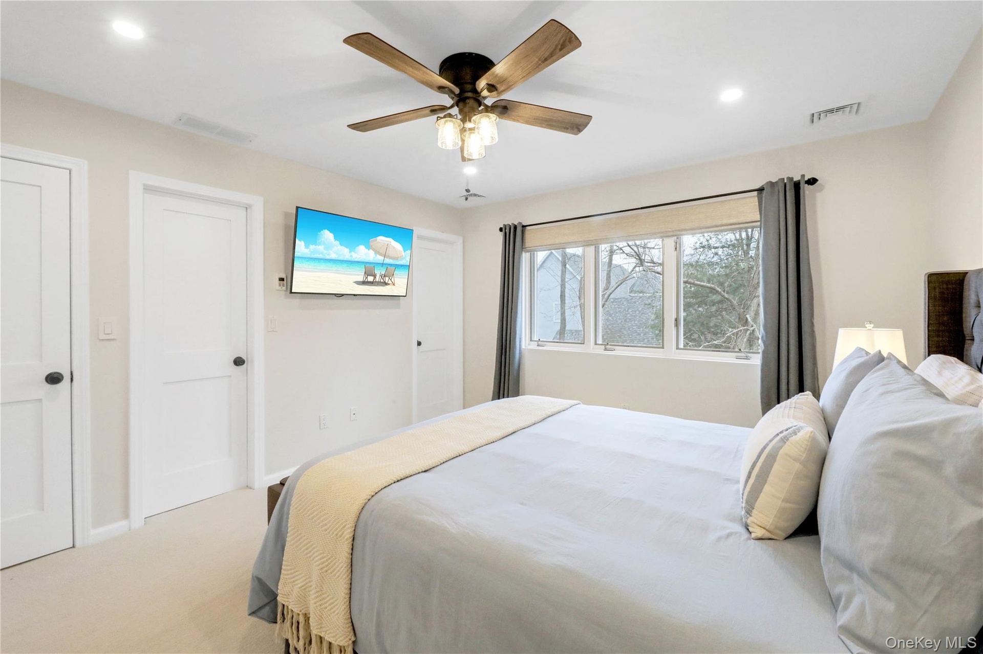 Bedroom with carpet floors, recessed lighting, and ceiling fan