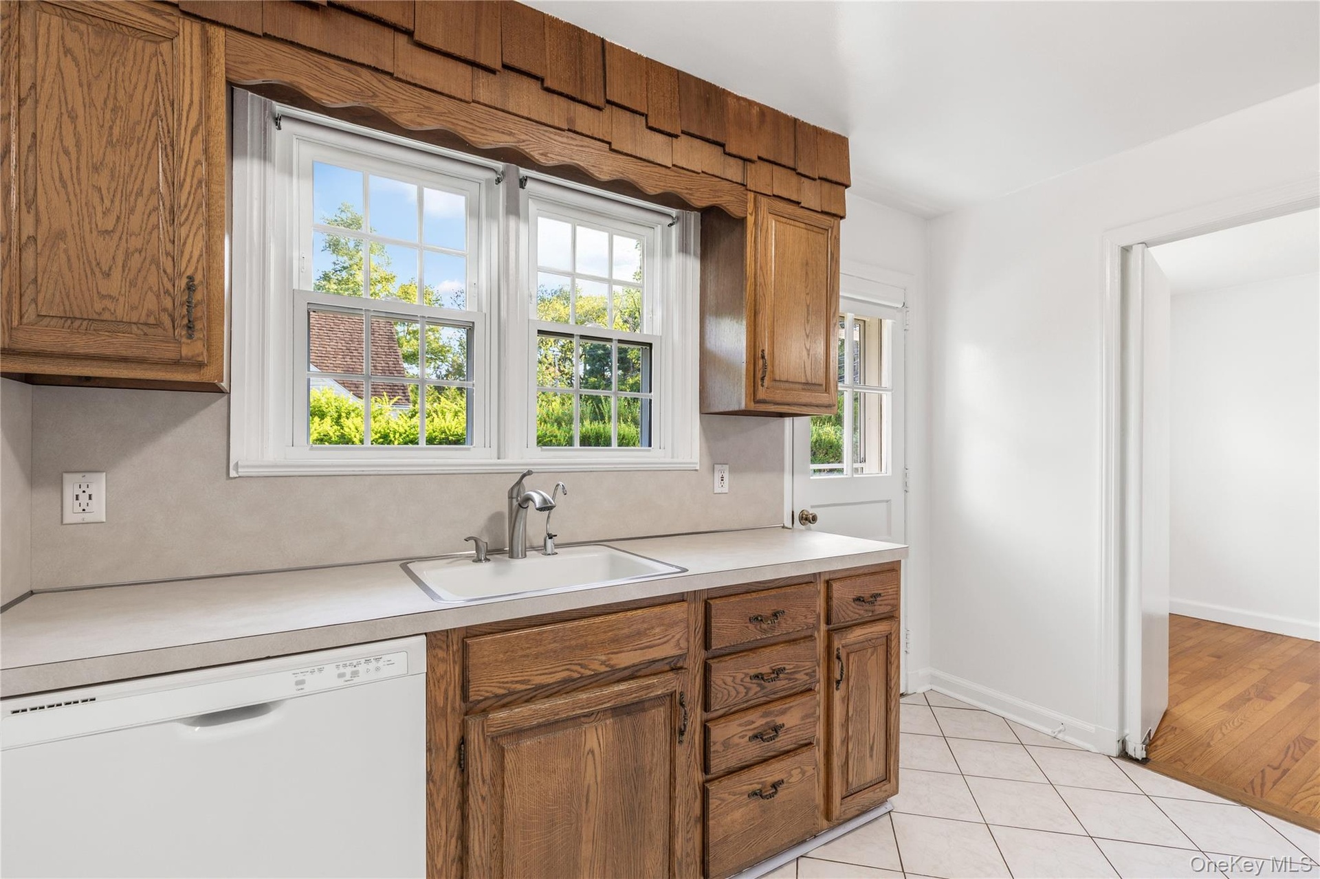kitchen with door out to patio and yard
