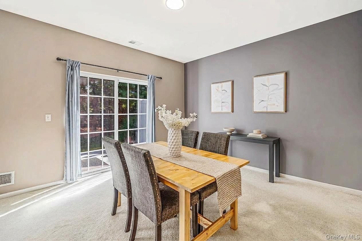 Dining room with sliding glass doors to rear yard