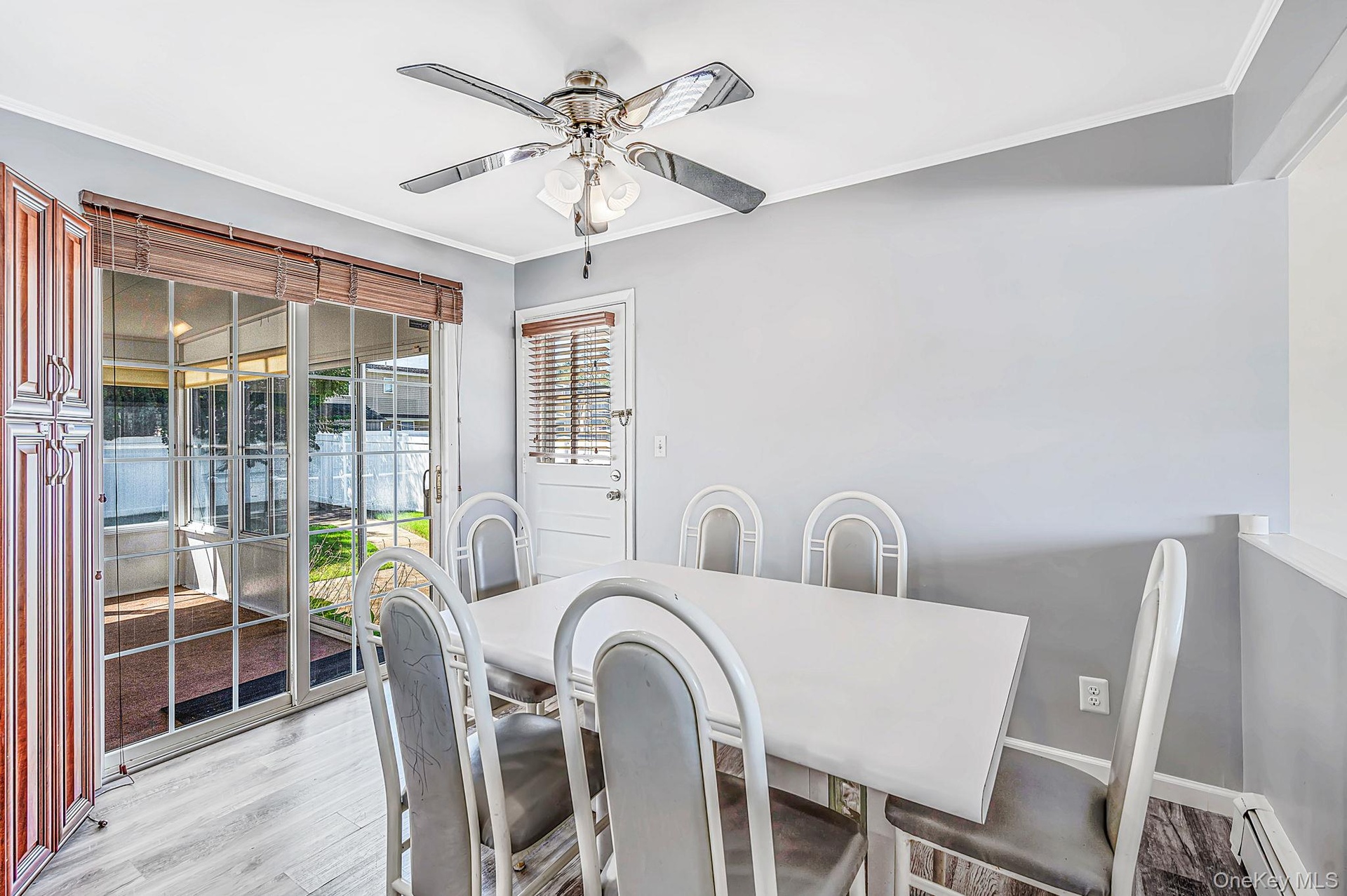Spacious Dining Area, Sliders to Sunroom